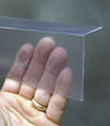 Closeup of a clear plastic covering on a Bluffton crawl space block wall