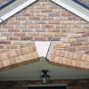 Major tuckpointing on a home archway over a door, with tuckpointing several inches wide that has failed on a Savannah home