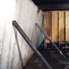 Temporary foundation wall supports stabilizing a Statesboro home