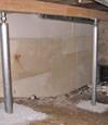 A system of crawl space support posts adding structural support to a crawl space in Metter