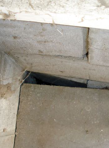 inward rotation of a foundation wall damaged by street creep in a garage in Bonaire