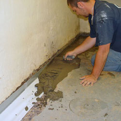 Testing a French drain system in a Bluffton home.