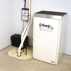 Sump pump system, dehumidifier, and basement wall panels installed during a sump pump installation in Saint Simons Island