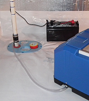 Closeup of a crawl space sump pump installed in Walterboro