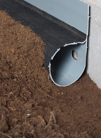 crawl space drain system installed in Claxton