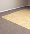 tiled and carpeted basement flooring installed in a Beaufort home