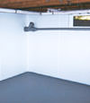 Warner Robins, GA and SC wet basement wall covering that tucks into a perimeter drainage system