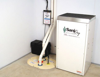 a complete basement waterproofing system installed in a Macon home