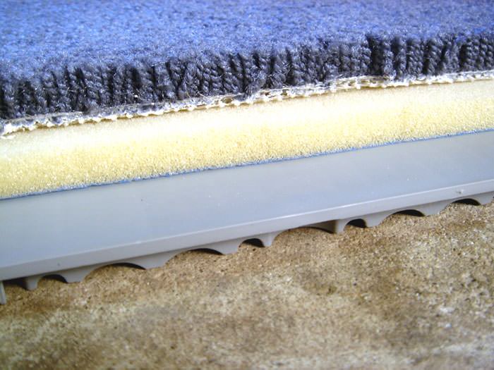 Thermaldry Basement Floor Matting Installed In Savannah Macon A Closeup View Of Our Sub Floor Matting With Basement Carpet Installed On Top