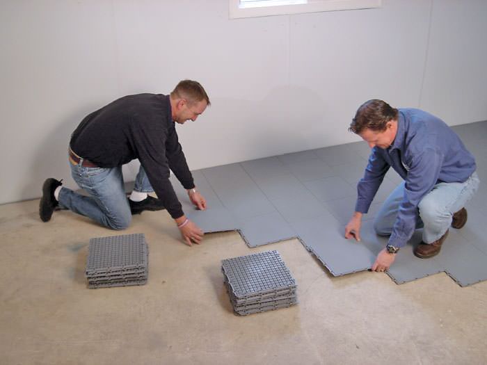Thermaldry Basement Floor Matting Installed In Savannah Macon Contractors Installing Basement Suloor Tileatting On A Concrete Floor In Mount Pleasant